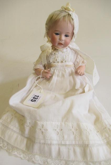 A Swaine & Co. bisque socket head doll Image