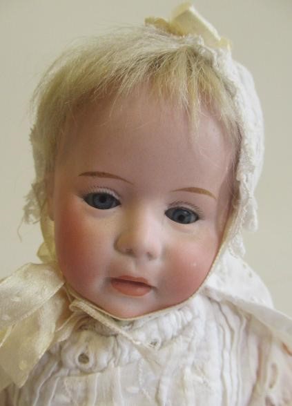 A Swaine & Co. bisque socket head doll Image