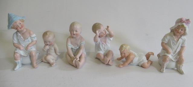 Six bisque Gebruder Heubach piano babies Image