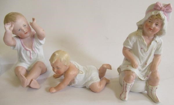 Six bisque Gebruder Heubach piano babies Image