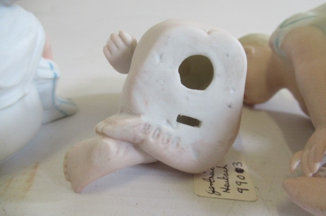 Six bisque Gebruder Heubach piano babies Image