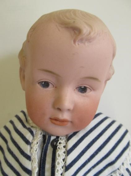 A rare Gebruder Heubach bisque socket head character boy Image