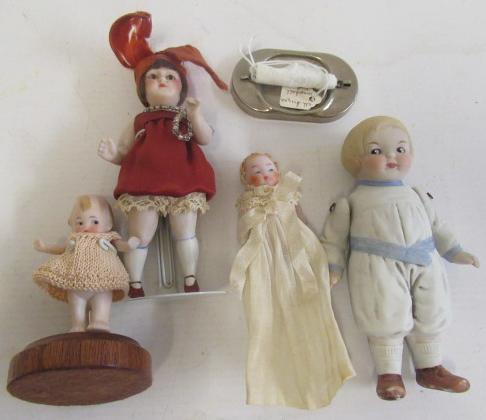Five small all bisque dolls Image