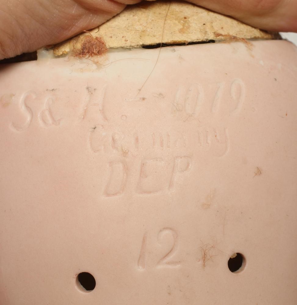 A Simon & Halbig bisque socket head doll Image