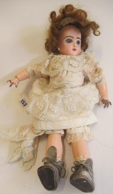A Bebe Jumeau bisque socket head doll Image