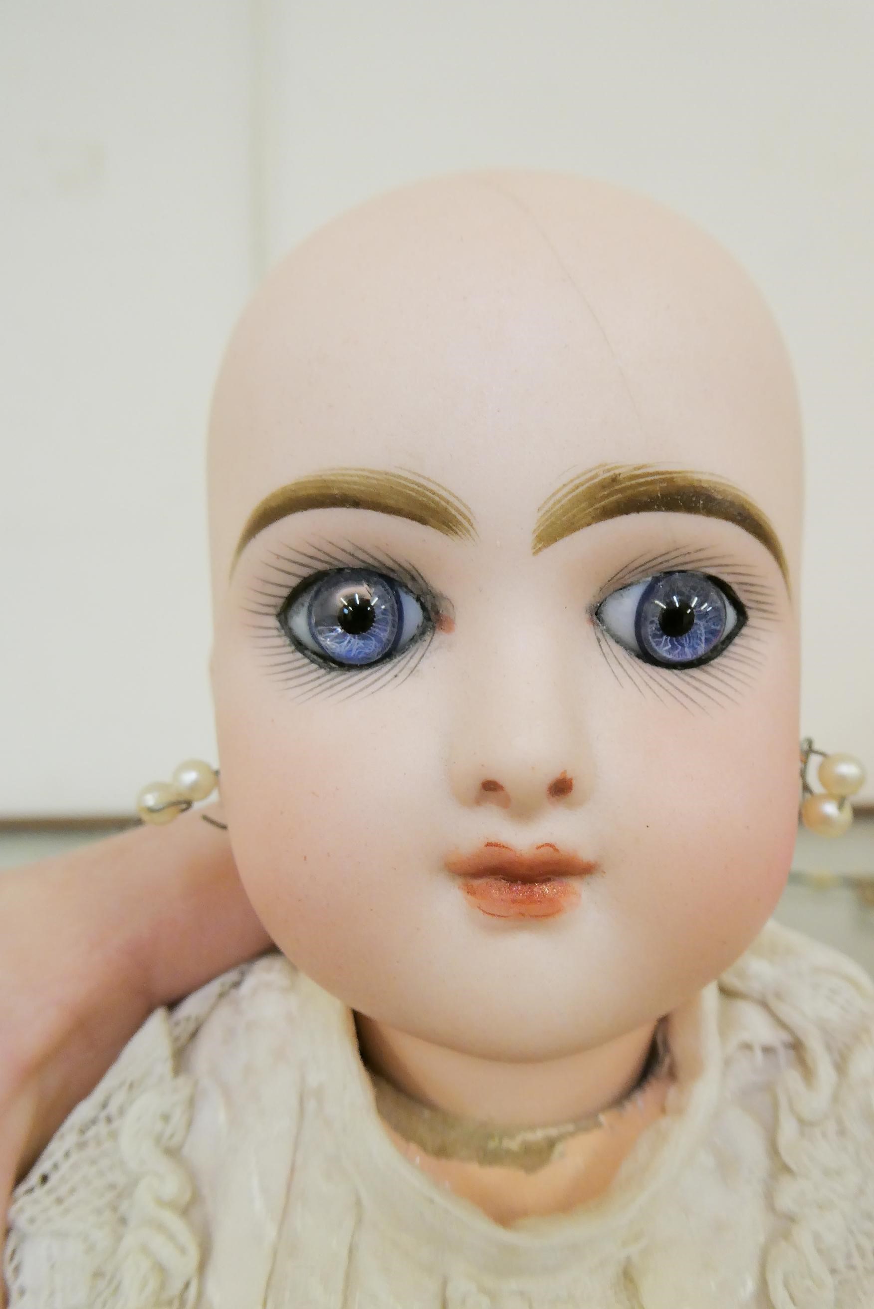A Bebe Jumeau bisque socket head doll Image