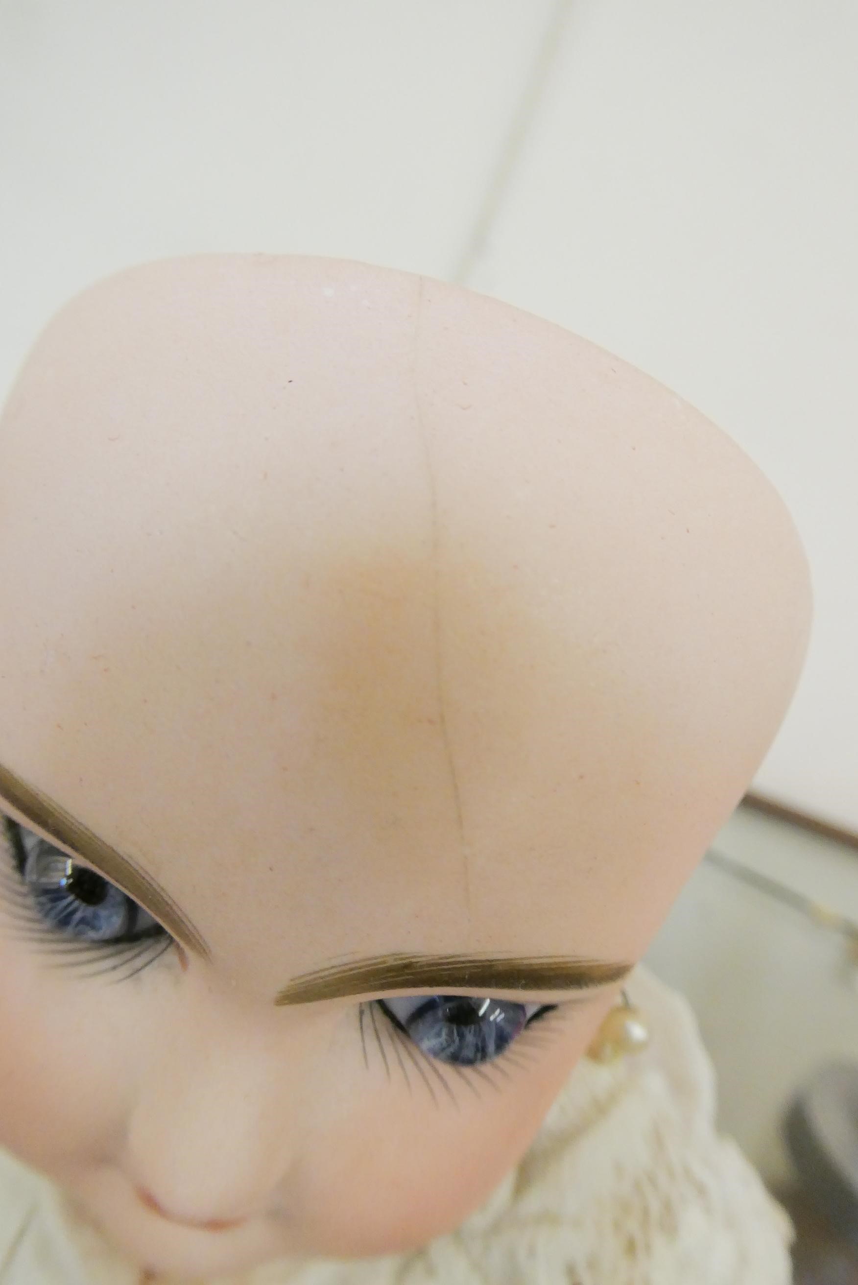 A Bebe Jumeau bisque socket head doll Image