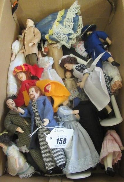Two boxes of doll's house dolls Image