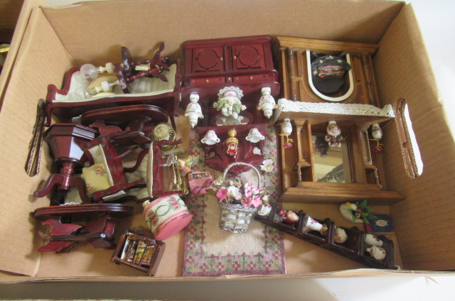 A large collection of modern doll's house furniture and decoration Image