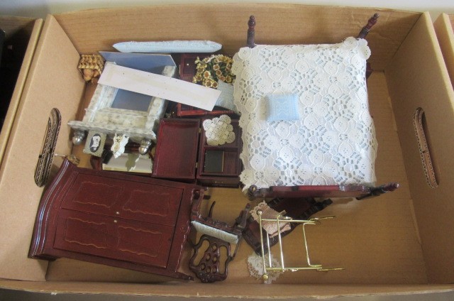 A large collection of modern doll's house furniture and decoration Image