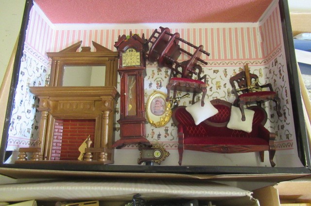 A large collection of modern doll's house furniture and decoration Image