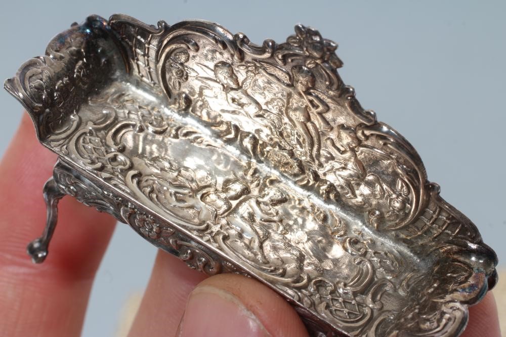 A boxed set of sterling silver doll's house furniture Image