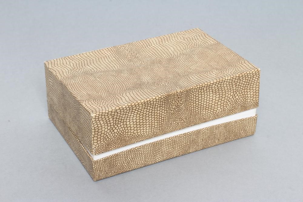 A boxed set of sterling silver doll's house furniture Image