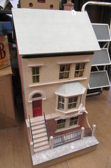 A large Georgian town house style doll's house Image