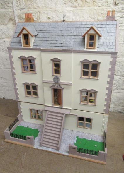 A large Georgian style doll's house Image