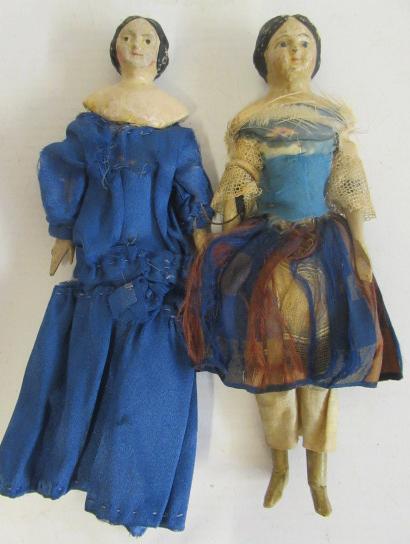 A pair of milliner composition shoulder head doll's house dolls Image