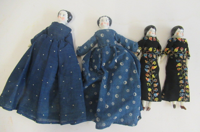 Four china head dolls Image