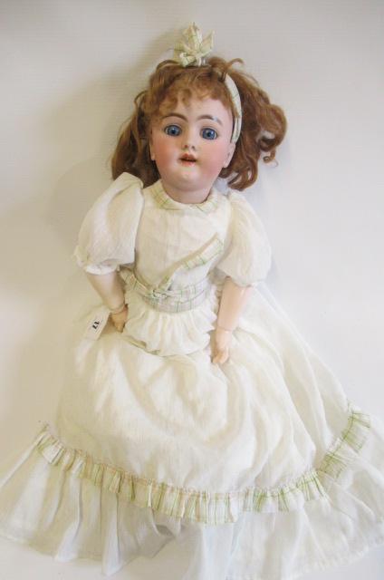 A Heinrich Handwerck bisque socket head doll Image
