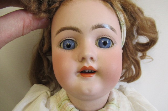 A Heinrich Handwerck bisque socket head doll Image