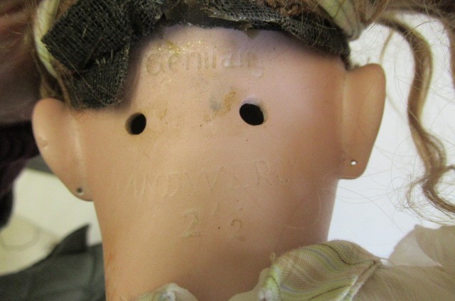 A Heinrich Handwerck bisque socket head doll Image