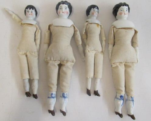 Four china head dolls Image