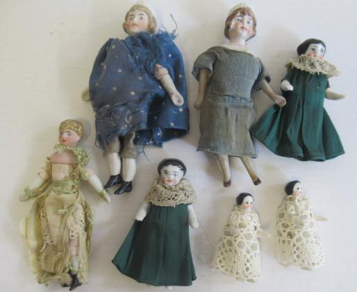 Seven doll's house dolls Image