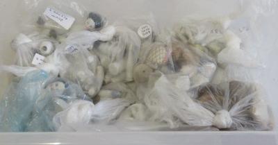 A large quantity of spare parts of miniature and doll's house dolls Image