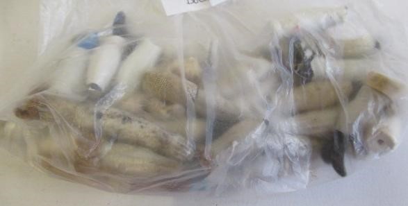 A large quantity of spare parts of miniature and doll's house dolls Image