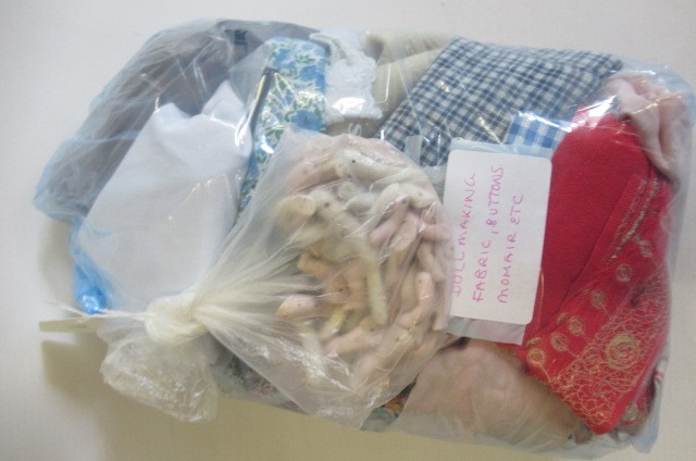 A large quantity of spare parts of miniature and doll's house dolls Image