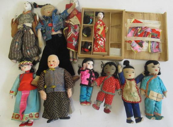 A collection of oriental dolls Image