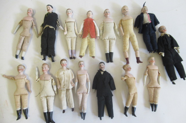 Fifteen bisque shoulder head miniature male dolls Image