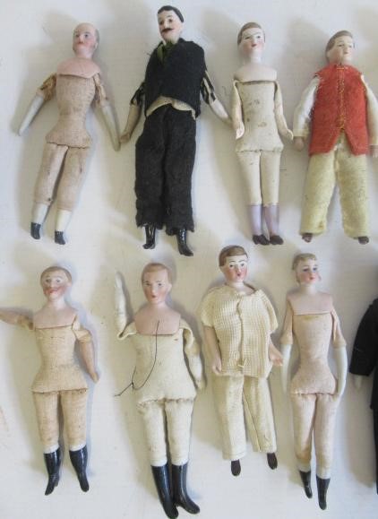 Fifteen bisque shoulder head miniature male dolls Image