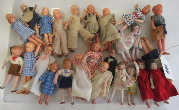 A large quantity of miniature and doll's house dolls Image