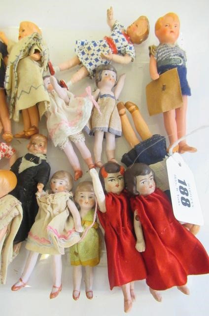 A large quantity of miniature and doll's house dolls Image
