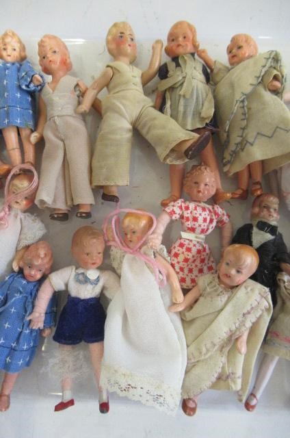 A large quantity of miniature and doll's house dolls Image