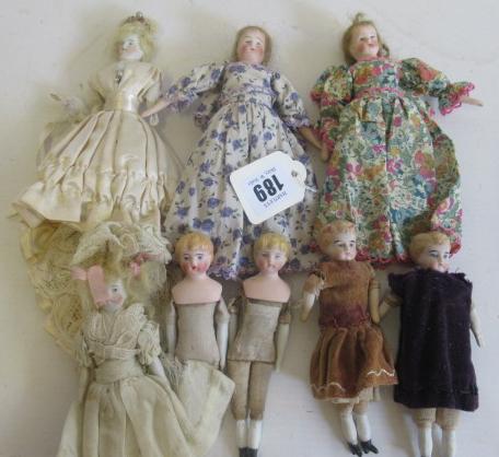 Eight miniature dolls Image