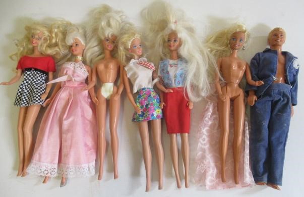 Two boxes of 15 Barbie dolls Image