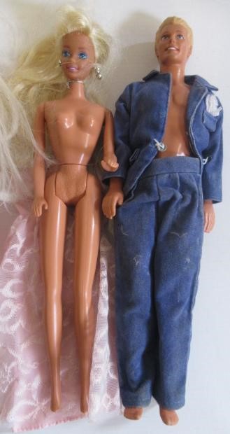 Two boxes of 15 Barbie dolls Image