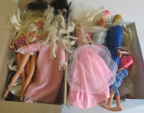 Two boxes of 15 Barbie dolls Image