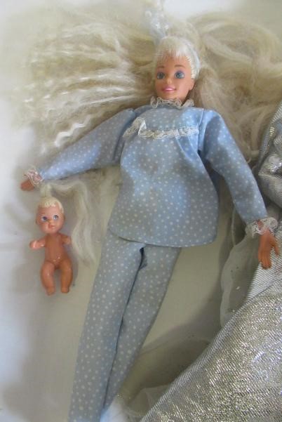 Two boxes of 15 Barbie dolls Image