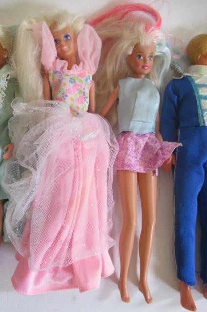 Two boxes of 15 Barbie dolls Image