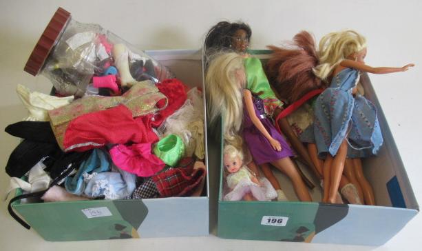 Two boxes of Barbie dolls and accessories Image