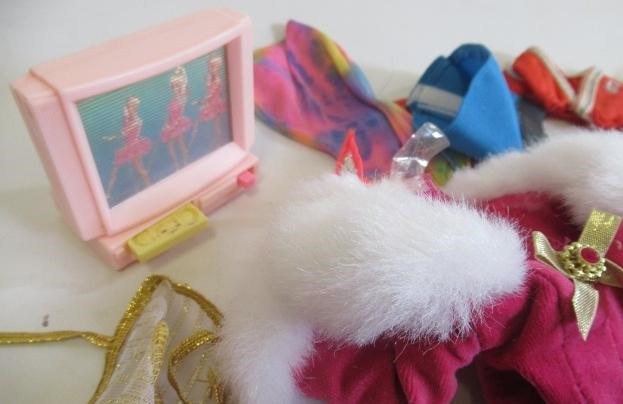 Two boxes of Barbie dolls and accessories Image