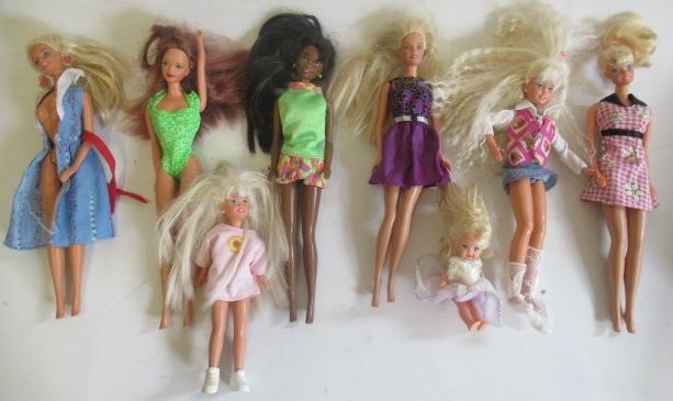 Two boxes of Barbie dolls and accessories Image