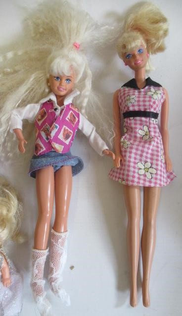 Two boxes of Barbie dolls and accessories Image