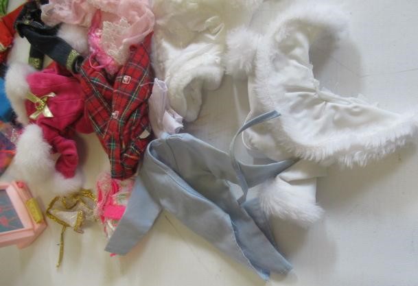 Two boxes of Barbie dolls and accessories Image