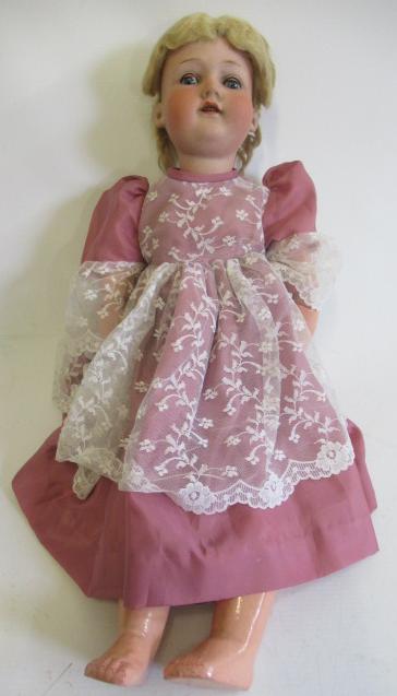 An Armand Marseille bisque socket head doll Image