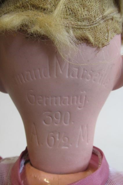 An Armand Marseille bisque socket head doll Image