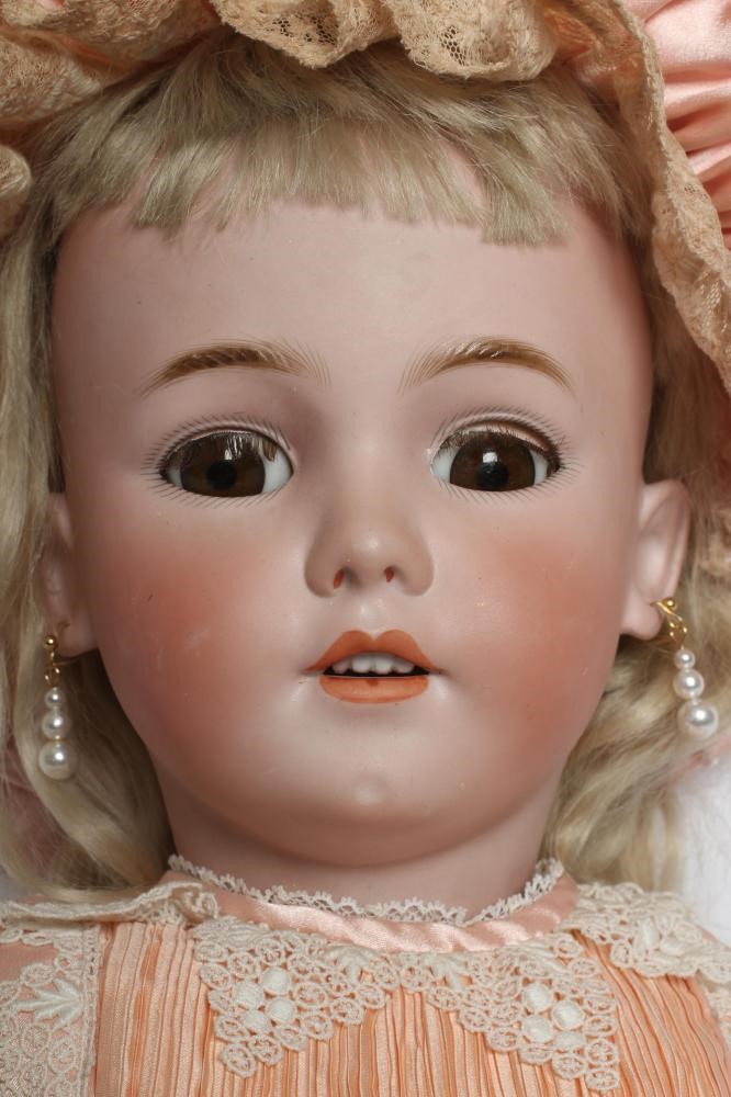 A large Simon & Halbig bisque socket head doll Image