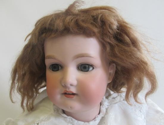 A large Armand Marseille bisque socket head doll Image
